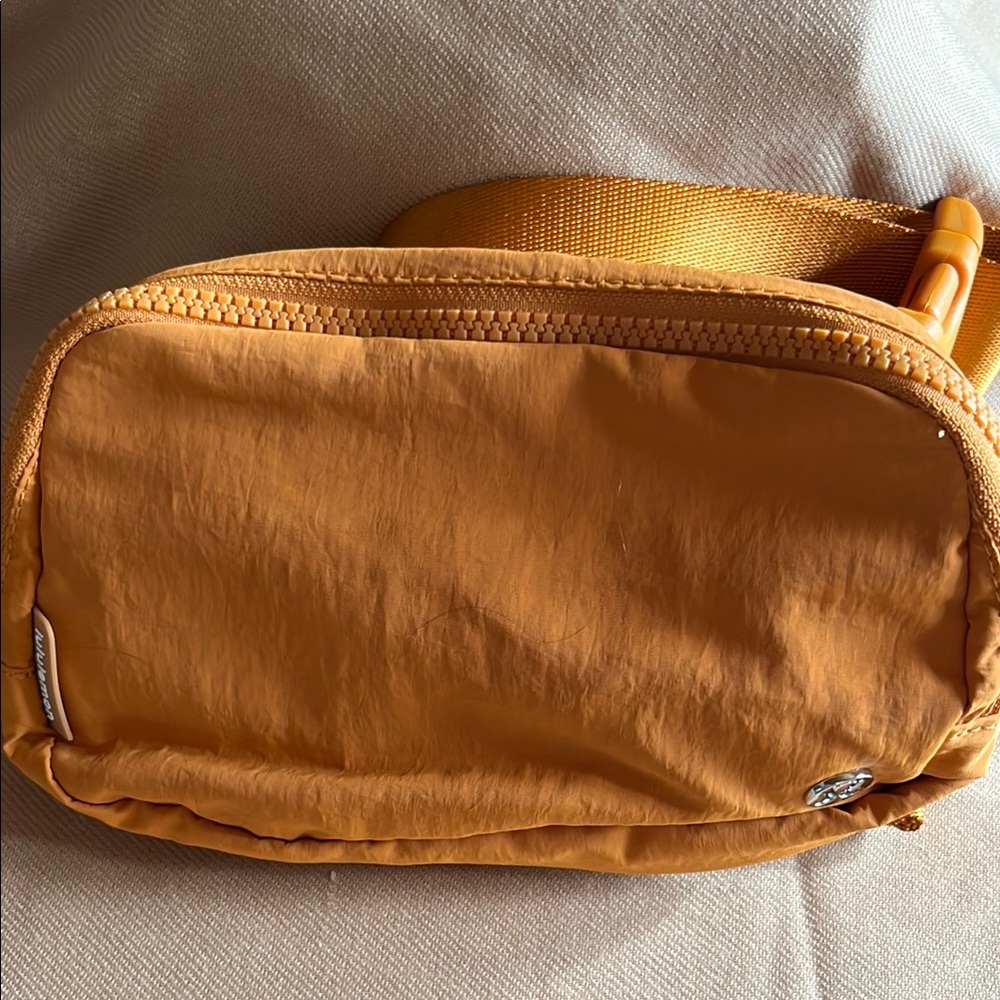 Lululemon Orange belt bag NWOT